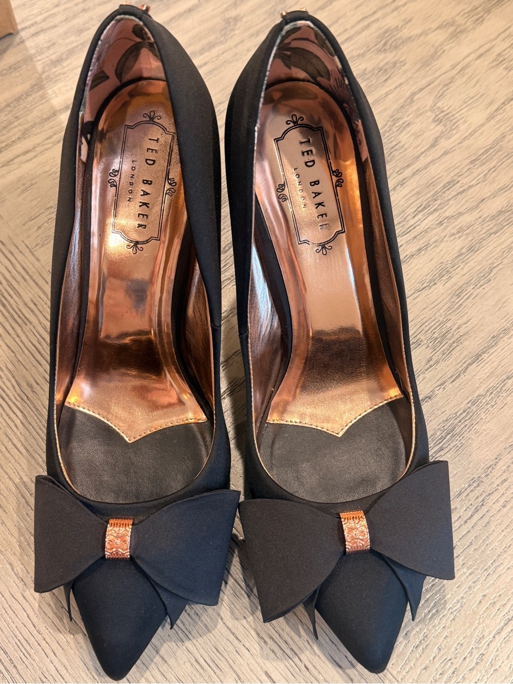 Ted Baker Black Pointed Toe Bow Pumps with Rose Gold Accent